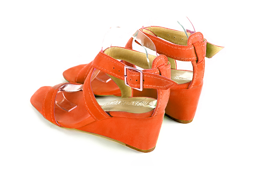 Women's clementine orange elegant fully open cross straps sandals. Square toe. Medium wedge heels - Rear view